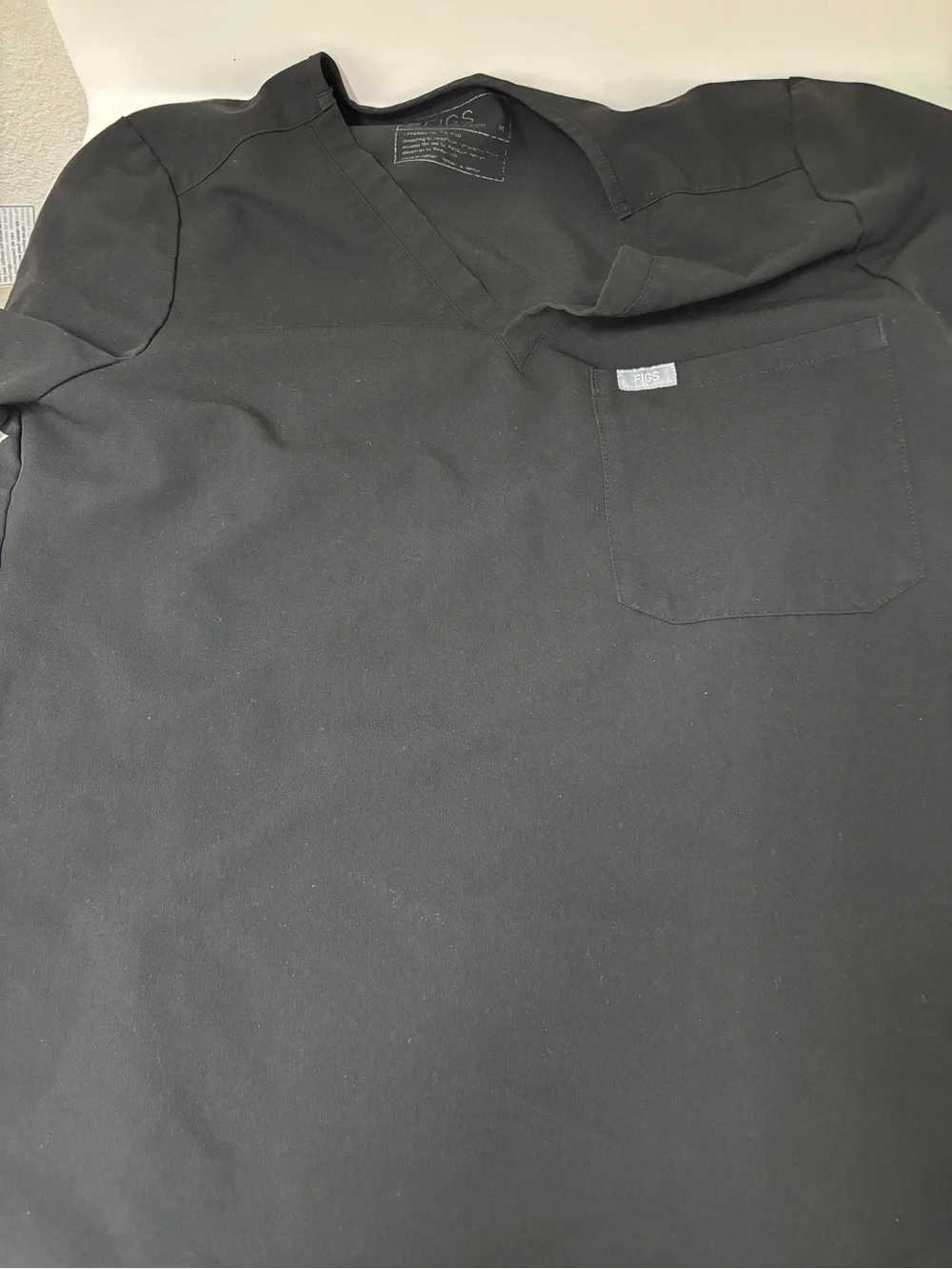 FIGS women’s Catarina Black Scrub Top - V-Neck Pocket